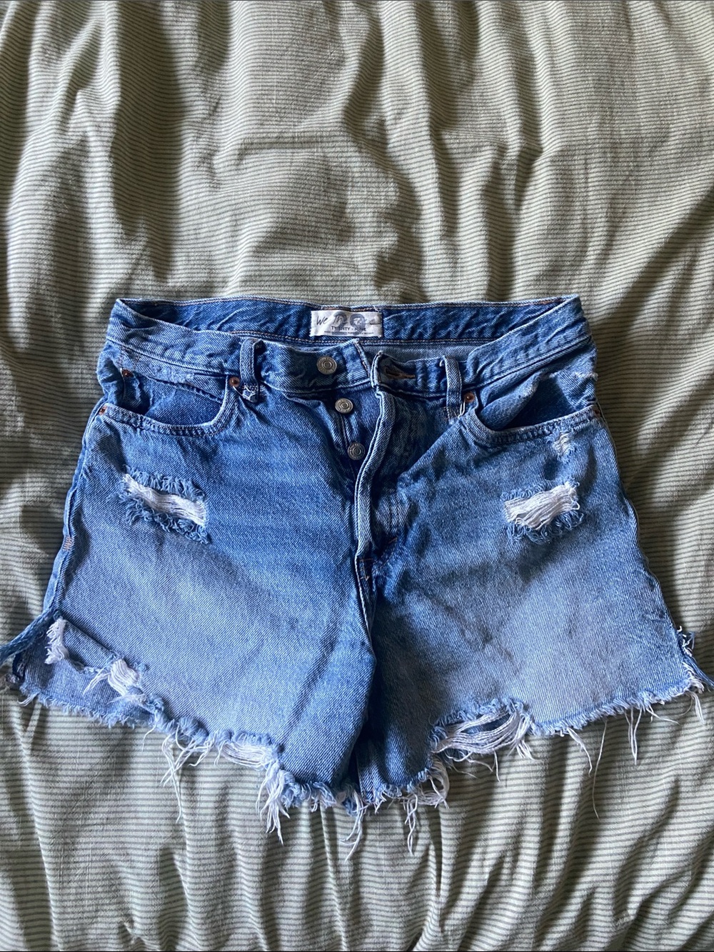 We The Free Light Blue Distressed Denim Shorts